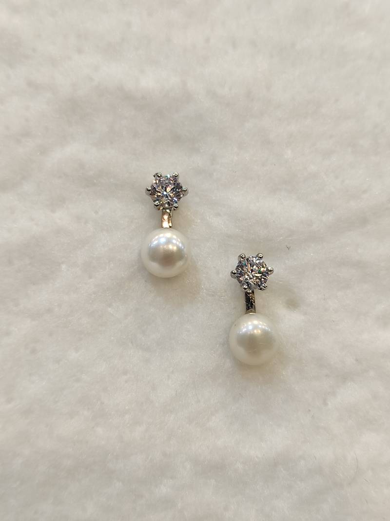 White pearl earrings