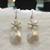 White pearl earrings