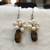 White pearl earrings