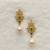 White pearl earrings