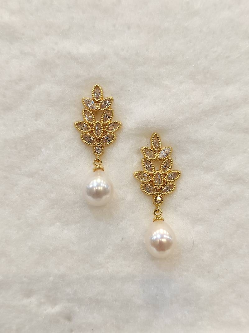 White pearl earrings