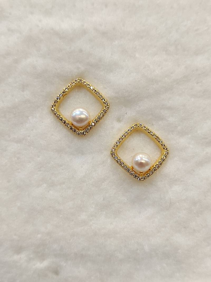 White pearl earrings