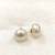 White pearl earrings