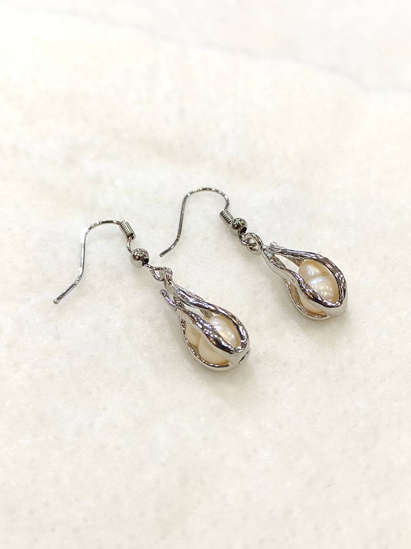 White pearl earrings