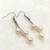 White pearl earrings