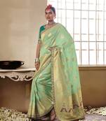 Sea green woven silk saree with blouse
