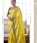 Yellow woven silk saree with blouse