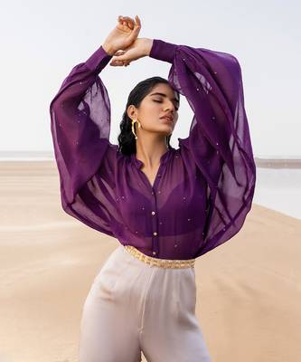 PURPLE CHITTA  IVORY JUMPSUIT WITH PURPLE BRALETTE AND A STATEMENT BELT 1