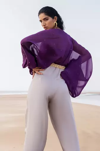 PURPLE CHITTA  IVORY JUMPSUIT WITH PURPLE BRALETTE AND A STATEMENT BELT