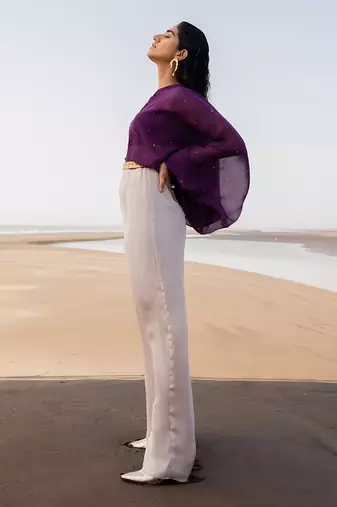 PURPLE CHITTA  IVORY JUMPSUIT WITH PURPLE BRALETTE AND A STATEMENT BELT