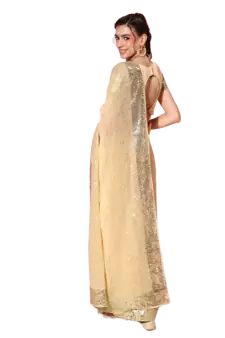 Cream embroidered georgette saree with blouse