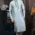 Turquoise embroidered art dupion silk kurta-pajama