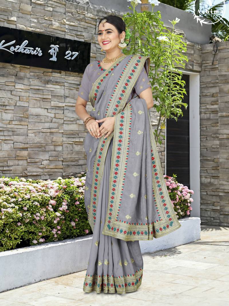 A HEAVY EMBROIDERY WORK & STONE WORK SAREE
