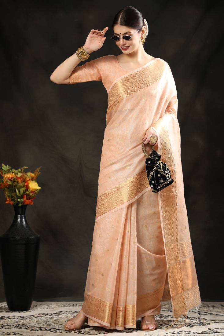 Cream woven raw silk saree with blouse