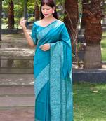 Green woven banarasi silk saree with blouse