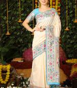 Teal hand woven raw silk saree with blouse