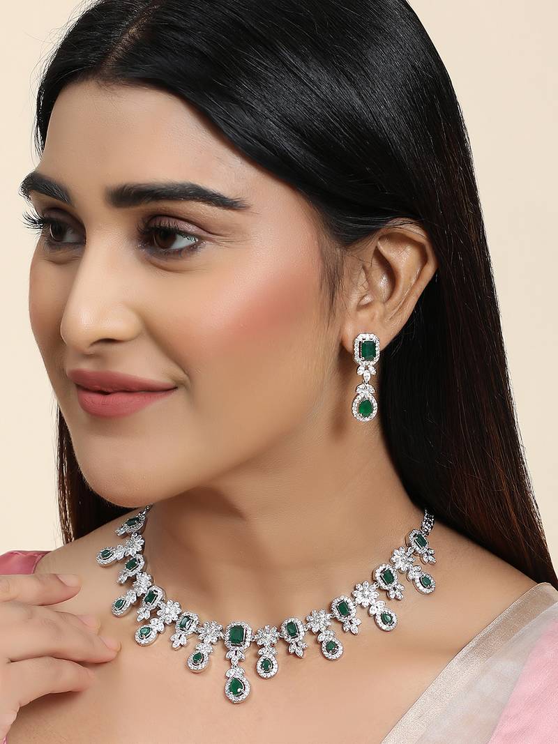Styylo Fashion Silver Plated AD & Emerald Green Stone Studded Jewellery Set