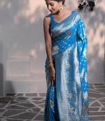 Ethnic And Rich Looking Sky Blue Colour Dola Silk Saree Designed With Heavy Wevon Designer