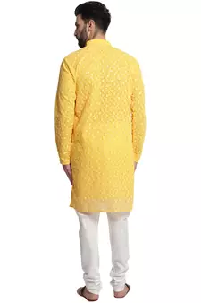 Yellow embroidered georgette kurta with churidar pajama