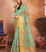Turquoise Embroidered Organza Saree With Blouse