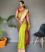 Green woven banarasi saree with blouse