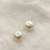 White pearl earrings