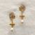 White pearl earrings