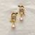 White pearl earrings