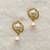 White pearl earrings