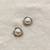 White pearl earrings