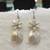 White pearl earrings
