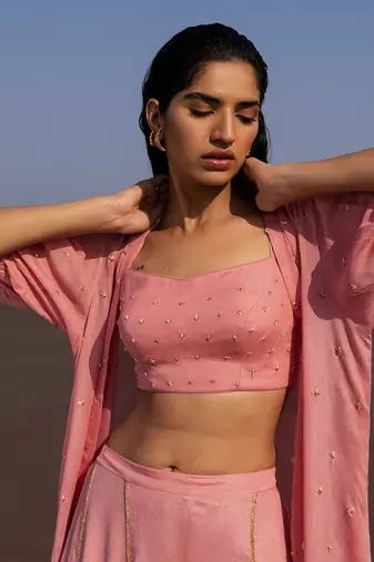 MAUVE CHITTA EMBROIDERED BLOUSE WITH FLARED LINE EMBROIDERED PANTS AND A LONG JACKET