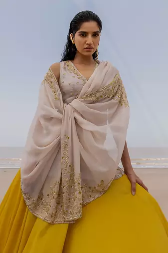 Ivory V Neck Jaal Organza Kurti With Ivory Bralette And Mustard Kalidar Palazzo With Corner Embroidered Butti Dupatta