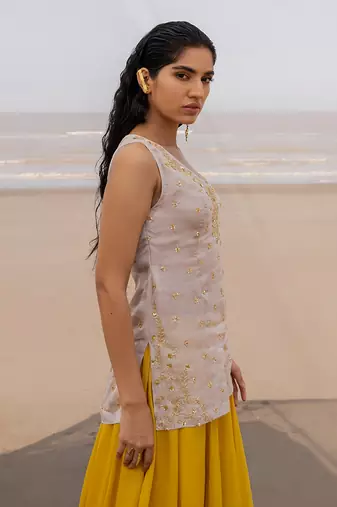 Ivory V Neck Jaal Organza Kurti With Ivory Bralette And Mustard Kalidar Palazzo With Corner Embroidered Butti Dupatta