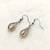White pearl earrings