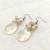 White pearl earrings