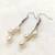 White pearl earrings