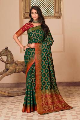 Green hand woven pure kanjivaram silk saree with blouse 1