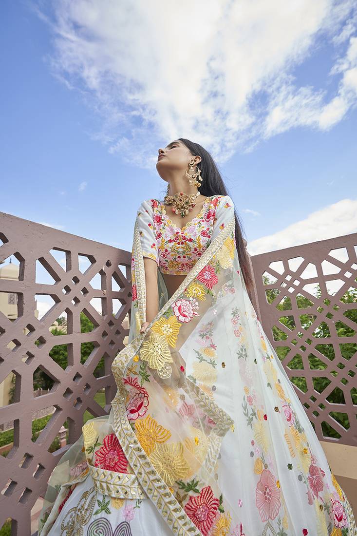 White embroidered Ark silk lehengha ethincwear with blouse