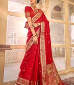 Red woven silk blend saree with blouse