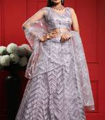 Lavender Embroidered Net Semi Stitched Lehenga Up To 42" Size