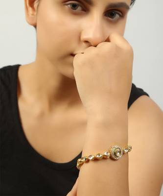 Gold toned kundan inspired bracelet with pearls 1