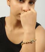 Gold toned kundan inspired bracelet with pearls