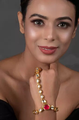 Red Gold toned royal kundan hathphool