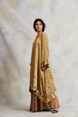 Gold silk tissue flowy kurta with gota and asymetrical hemline paired with kalidaar pajama 2