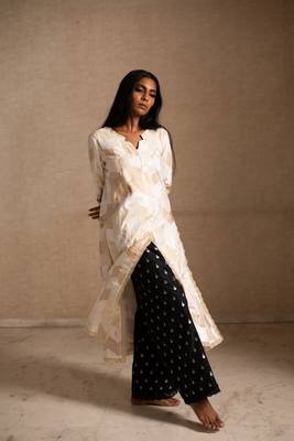 Upcycled patchwork kurta  in shades of ivory and beige made with remnants of heritage fabrics like silks,cottons, prints 2
