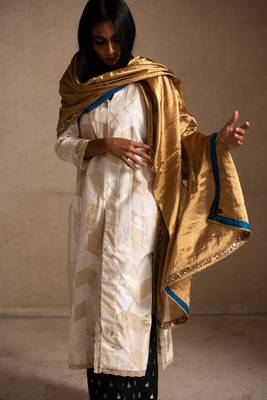 Upcycled patchwork kurta  in shades of ivory and beige made with remnants of heritage fabrics like silks,cottons, prints 5