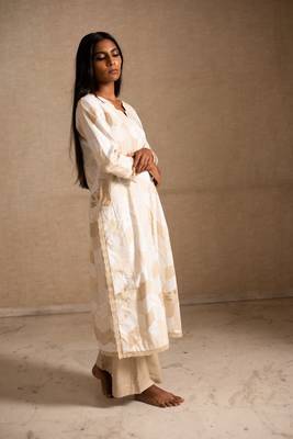 Upcycled patchwork kurta in shades of ivory and beige made with remnants of heritage fabrics like silks,cottons,prints. 3