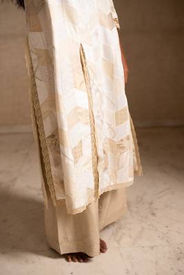 Upcycled patchwork kurta in shades of ivory and beige made with remnants of heritage fabrics like silks,cottons,prints. 4