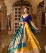 Upcycled patchwork lehenga in shades of yellow made with remnants of heritage fabrics like silks, cottons, prints.